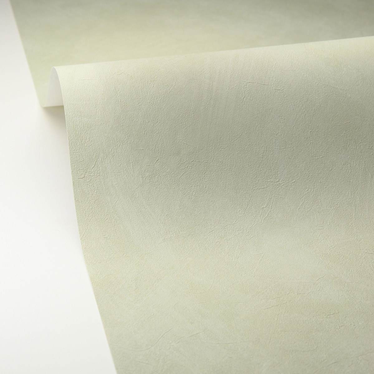 Papier peint Uni Enduit La Chaux vert amande - Origine de Casélio AMB5| Réf. OGN106087046