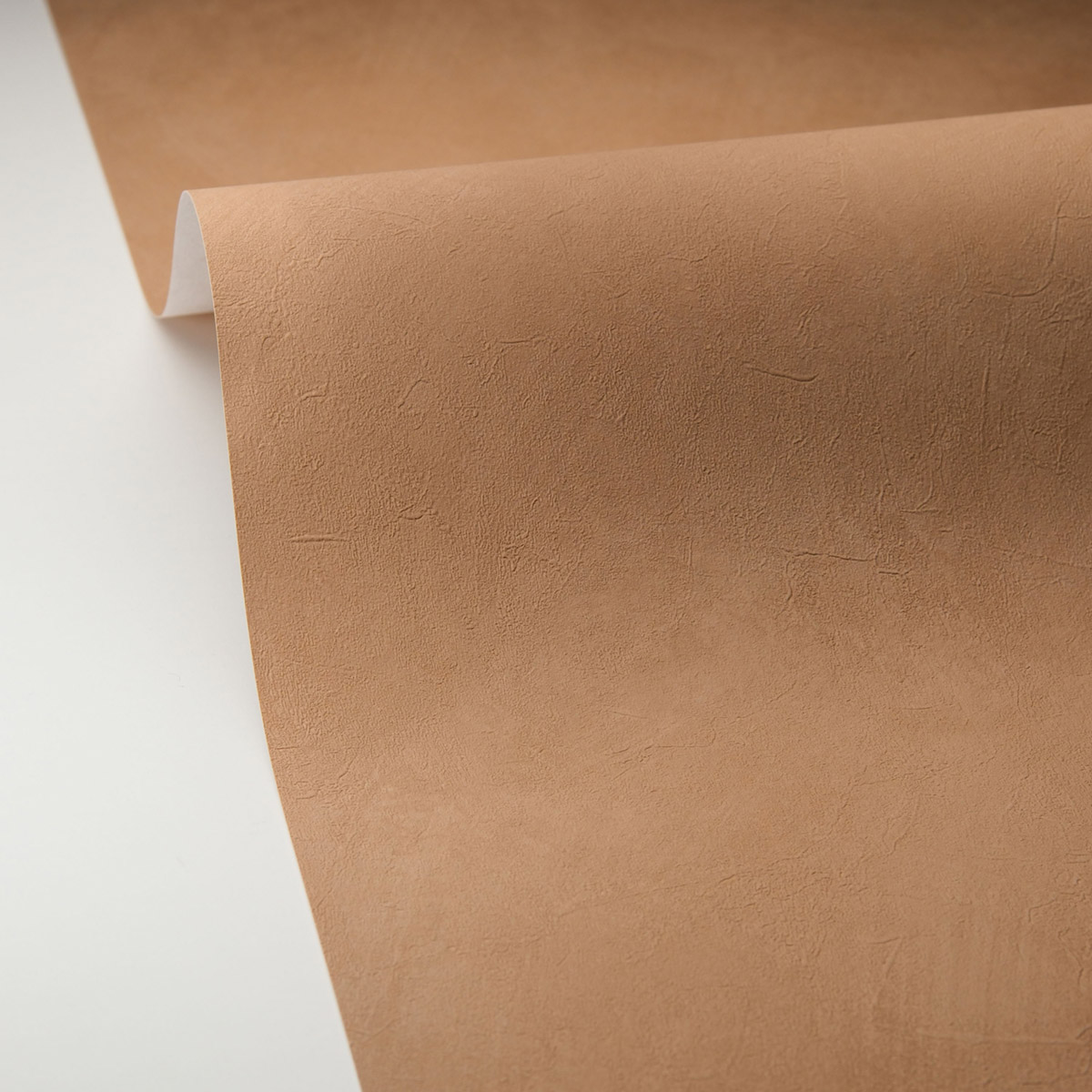 Papier peint Uni Enduit La Chaux camel clair - Origine de Casélio | Réf. OGN106081350