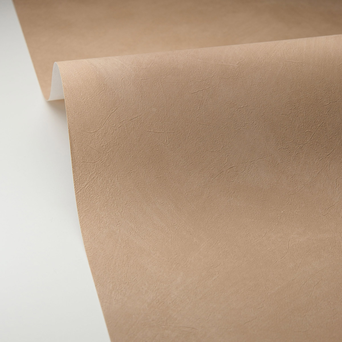 Papier peint Uni Enduit La Chaux marron glacé - Origine de Casélio AMB5| Réf. OGN106081479