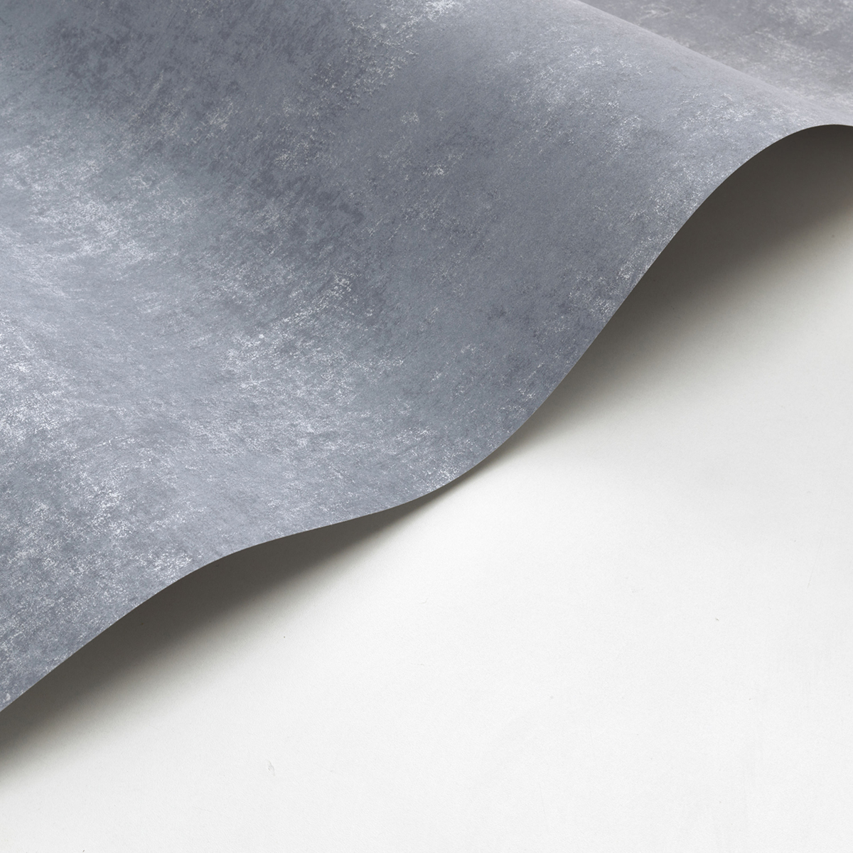 Papier peint Faux Uni Stone bleu étain et argenté - Voyage Onirique de Casadéco | Réf. ONIR80839424