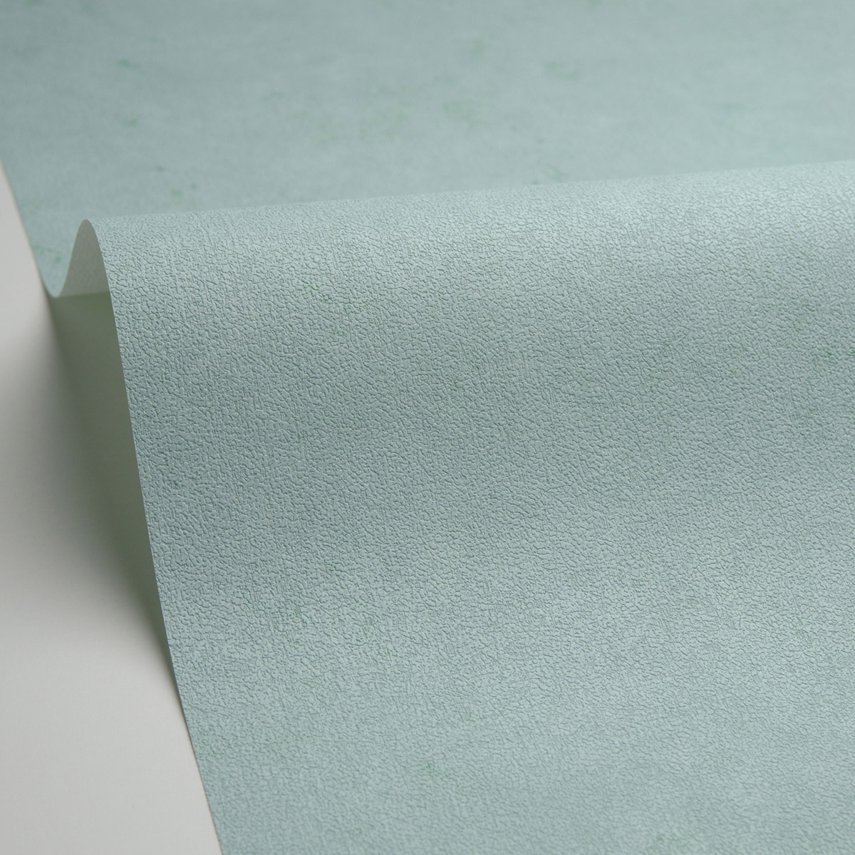 Papier peint Uni Terre Cuite Métallisé vert menthe irisé - Céramique de Casélio AMB4| Réf. CER105257150