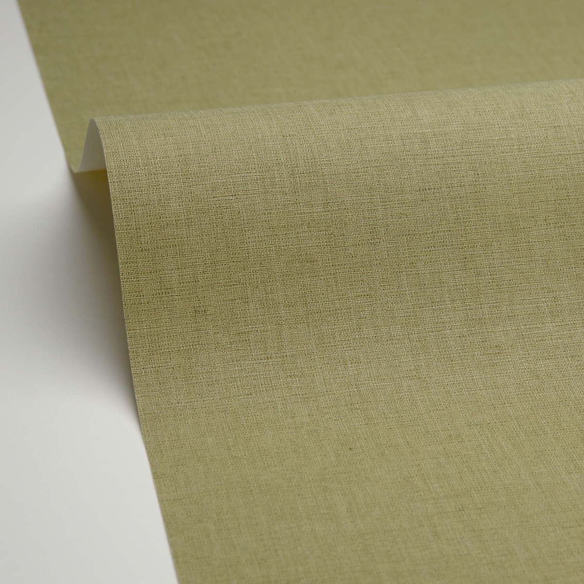 Papier peint Faux Uni Tissage vert pinède - Graphic de Casélio AMBV | Réf. GPC103227412