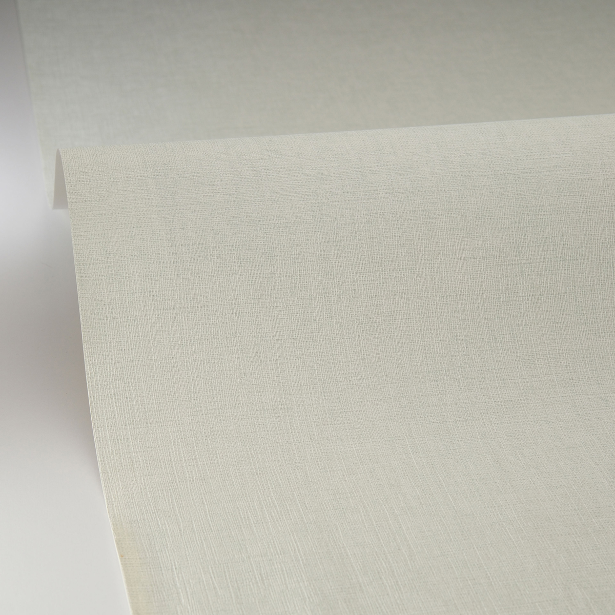 Papier peint Faux Uni Tissage vert pâle - Maison Siméon de Casélio VAGUE | Réf. MSI103227603
