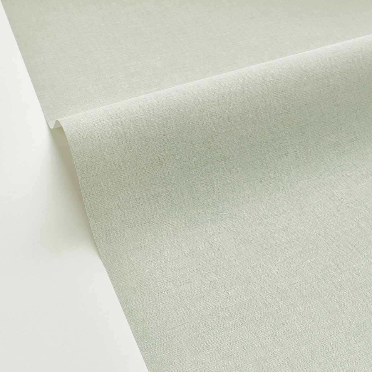 Papier peint Faux Uni Tissage vert amande - Graphic de Casélio | Réf. GPC103227128