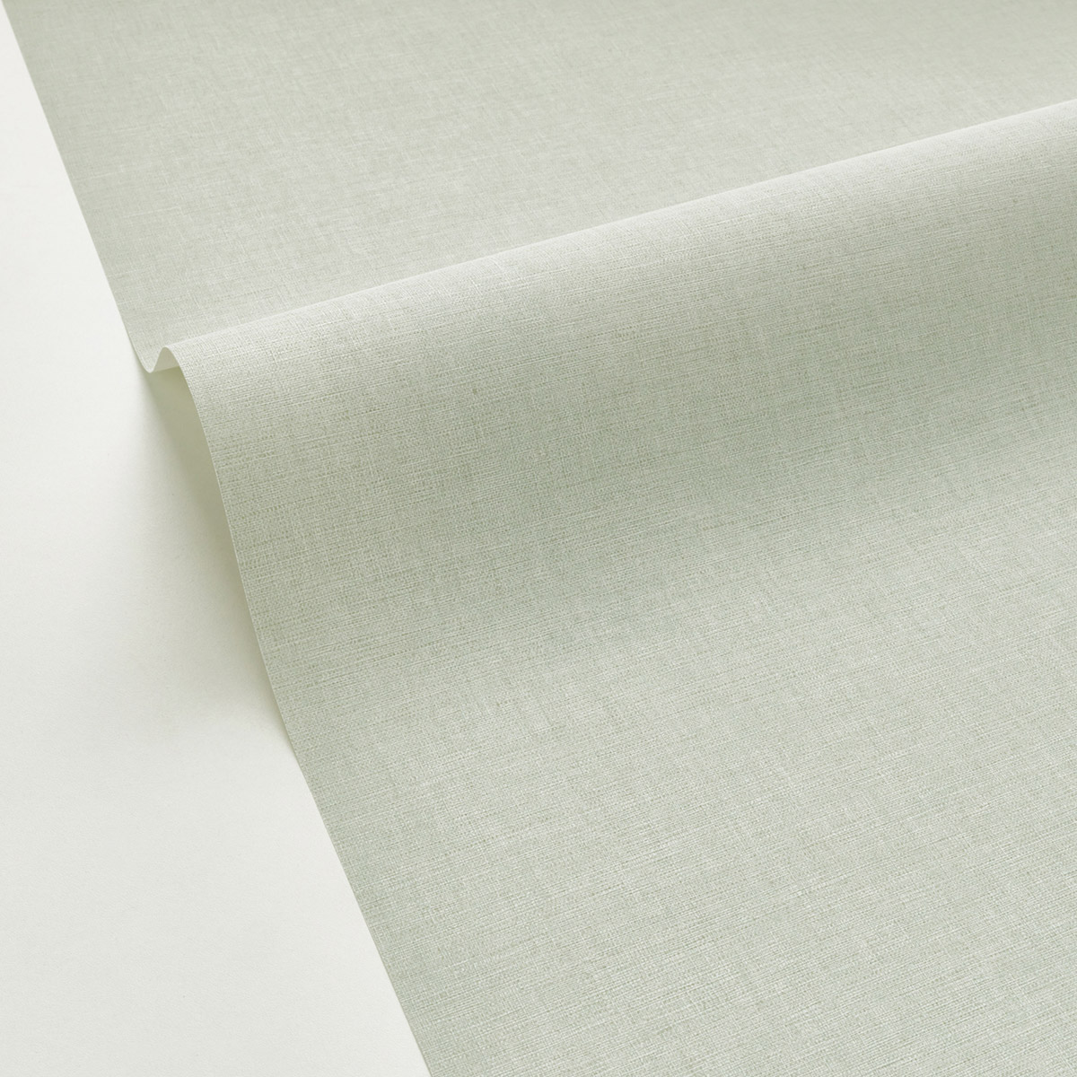 Papier peint Faux Uni Tissage vert amande - Art of Botany de Casélio AMBV | Réf. AOB103227128