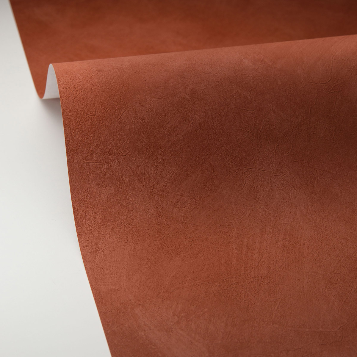 Papier peint Uni Enduit La Chaux terre de sienne - Origine de Casélio AMB5| Réf. OGN106088000